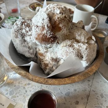 Morgans Restaurant - The beignets you MUST have. They come with a trio of sauces- caramel, chocolate, and raspberry. - New American Near Me - Miami, Florida