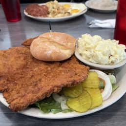 Breaded Tenderloin Sandwich, 2 Eggs and Corned Beef Hash Breakfast Breaded Tenderloin Sandwich, 2 Eggs and Corned Beef Hash Breakfast