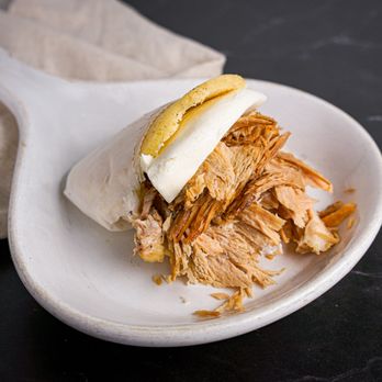 Sabor Venezolano Calle 8 - Arepa with roasted pork and queso de mano (cheese) - Venezuelan Near Me - Miami, Florida Sabor Venezolano Calle 8 - Arepa with roasted pork and queso de mano (cheese) - Venezuelan Near Me - Miami, Florida