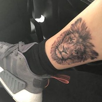 Evolvink Studios - The lion that Justin did for me - Piercing Near Me - Morristown, New Jersey