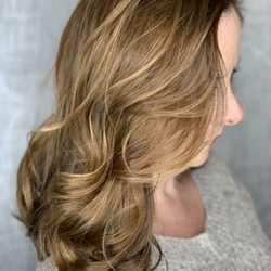 Copper tones with some blonde going through it looks so beautiful together softly with a nice layered cut.