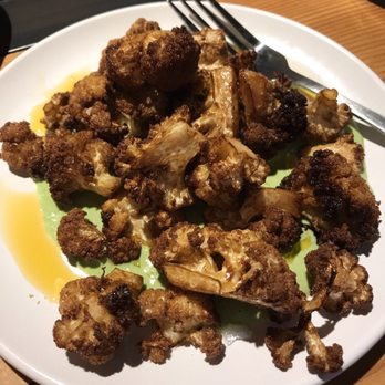 Pollo Bravo - Rotisserie cauliflower over green goddess dressing and chili oil - Tapas/Small Plates Near Me - Portland, Oregon