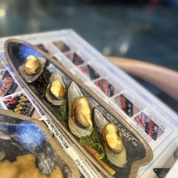 Mira Sushi - a plate of mussels and a plate of fried mussels - Sushi Bars Near Me - Chicago, Illinois Mira Sushi - a plate of mussels and a plate of fried mussels - Sushi Bars Near Me - Chicago, Illinois
