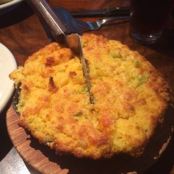 Rutherford Grill - Cornbread in cast iron skillet, with jalapeno and cheese.  Spicy, sweet, and cheesy.  Divine! - American Near Me - Rutherford, California