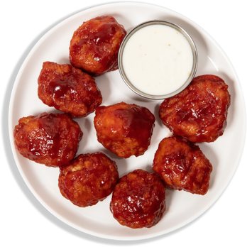 Wing SZN North Miami - a plate of chicken wings with dipping sauce - Food Delivery Services Near Me - North Miami, Florida Wing SZN North Miami - a plate of chicken wings with dipping sauce - Food Delivery Services Near Me - North Miami, Florida