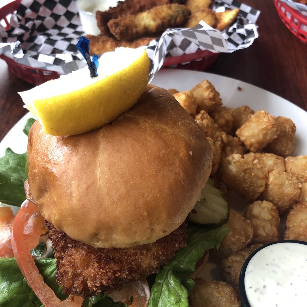 The Loose Wheel - Fish sandwich and deep fried pickle. - Bars Near Me - Tacoma, Washington The Loose Wheel - Fish sandwich and deep fried pickle. - Bars Near Me - Tacoma, Washington