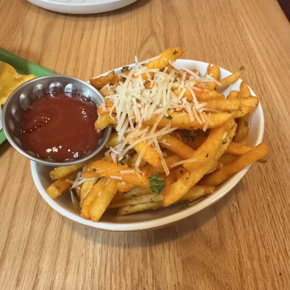 Canard - The garlic fries have an extra chili zing to them, so good! - New American Near Me - Beaverton, Oregon