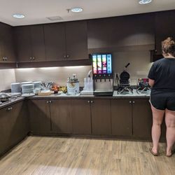 Residence Inn Burlington Colchester - Breakfast Area 3/4 Oatmeal, juices, 2 x Belgian waffle makers.