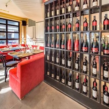 Nittis Italian Restaurant in Hell's Kitchen - a wall of wine bottles in a restaurant - Italian Near Me - New York, New York Nittis Italian Restaurant in Hell's Kitchen - a wall of wine bottles in a restaurant - Italian Near Me - New York, New York