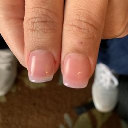 Uneven and colors don't match. She didn't even cut my cuticles just made me bleed from the drill
