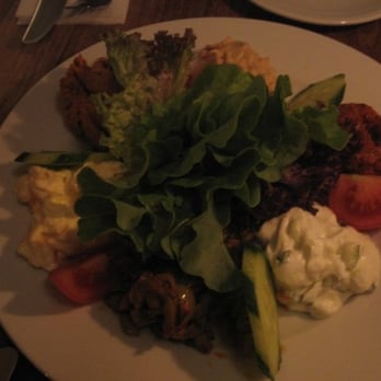 Defne - Appetizer of fresh hummus, red pepper/chili paste, fresh tzaziki, green olive salad, garlic carrots and walnut chili paste - Turkish Near Me - Berlin, BE