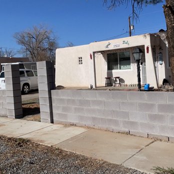 Serrano & Bros. - Front yard block wall with pillars for wrought iron installation - Masonry/Concrete Near Me - Albuquerque, New Mexico
