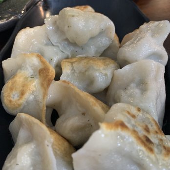 Dumpling Era - Pan fried pork and green chive dumplings. - Chinese Near Me - San Bruno, California Dumpling Era - Pan fried pork and green chive dumplings. - Chinese Near Me - San Bruno, California