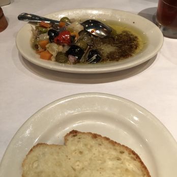Antico Posto - Bread with yummy olive oil, vinegar, cheese, olives, and pickled veggies - Italian Near Me - Oak Brook, Illinois Antico Posto - Bread with yummy olive oil, vinegar, cheese, olives, and pickled veggies - Italian Near Me - Oak Brook, Illinois