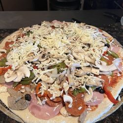 Land & Sea Restaurant - Large supreme pizza.