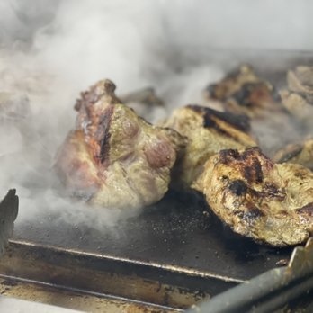 Gringo’s Tacos - Here is the pork butt being grilled before it gets slow cooked for 6 hours. - Tacos Near Me - Spring Branch, Texas