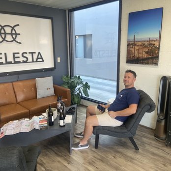 Caelesta Wines and Vineyard - a man sitting in a chair - Wine Tasting Room Near Me - Templeton, California Caelesta Wines and Vineyard - a man sitting in a chair - Wine Tasting Room Near Me - Templeton, California