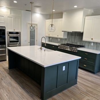 GSS Remodel - a kitchen with a large island - General Contractors Near Me