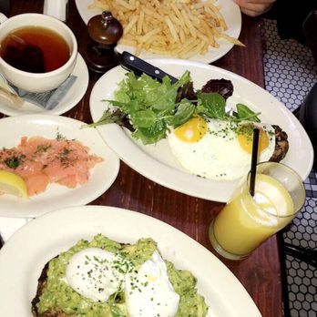 The Smith - Salmon lock Benedict, mushroom toast, and avocado toast. - New American Near Me - New York, New York