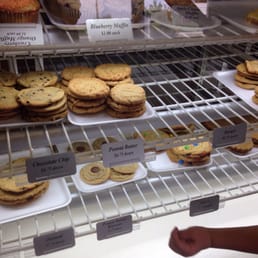 a display of cookies and pastries