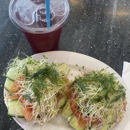 Loaded lox on an everything bagel with a hibiscus iced tea