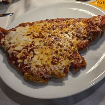 Friendlier - Porkchop parmigiana - Pizza Near Me - Woodmere, New York Friendlier - Porkchop parmigiana - Pizza Near Me - Woodmere, New York