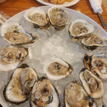 Dixie Crossroads - Now that's a Dozen! - Seafood Near Me - Titusville, Florida Dixie Crossroads - Now that's a Dozen! - Seafood Near Me - Titusville, Florida
