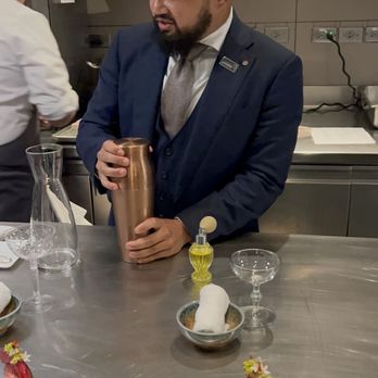 Alinea - Shaking up a drink in the kitchen to go with our next course - New American Near Me - Chicago, Illinois