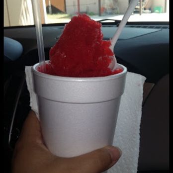 Silvia's Raspas - a hand holding a cup of ice cream - Desserts Near Me - Mission, Texas Silvia's Raspas - a hand holding a cup of ice cream - Desserts Near Me - Mission, Texas