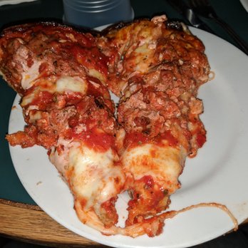 Chicago Pizza Tours - Sausage slices at Pequod's. - Tours Near Me - Chicago, Illinois Chicago Pizza Tours - Sausage slices at Pequod's. - Tours Near Me - Chicago, Illinois