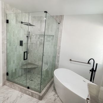 Palafox Premium Construction - a large bathroom with a walk in shower - General Contractors Near Me Palafox Premium Construction - a large bathroom with a walk in shower - General Contractors Near Me