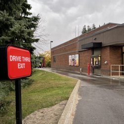 Tim Hortons - Tim Hortons - storefront drive thru lane