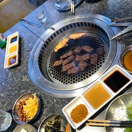 Dipping sauces included sweet soy sauce, sesame sauce, and dried chilies dip. Dipping sauces included sweet soy sauce, sesame sauce, and dried chilies dip.