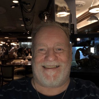 Eastside Station - a smiling man in a restaurant - Sports Bars Near Me - Snellville, Georgia Eastside Station - a smiling man in a restaurant - Sports Bars Near Me - Snellville, Georgia