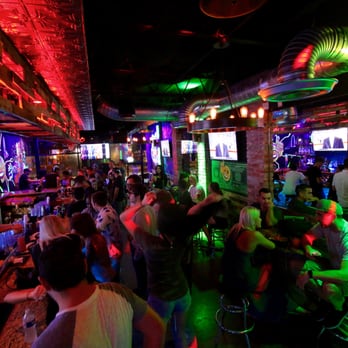 Long Shots - a crowded bar with neon lights - Sports Bars Near Me - Dallas, Texas Long Shots - a crowded bar with neon lights - Sports Bars Near Me - Dallas, Texas
