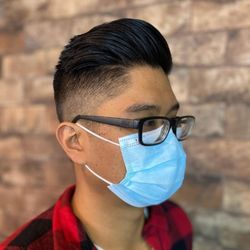 Mec Modern Barbering - Pompadour haircut by our barber, Jeff.