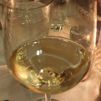 Mitch's on El Paseo - Sauvignon Blanc by Cloud Bay from New Zealand is an excellent pairing due to its crisp apple  notes. - Seafood Near Me - Palm Desert, California