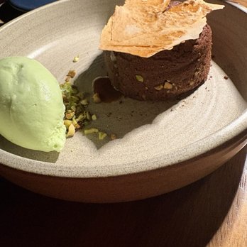 Cocina del Mar - Dark chocolate pistachio cake with pistachio ice cream - Seafood Near Me - Cabo San Lucas, BCS Cocina del Mar - Dark chocolate pistachio cake with pistachio ice cream - Seafood Near Me - Cabo San Lucas, BCS
