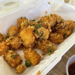 Tater tots with lots of garlic and parsley - served with ranch dressing. YUM! Tater tots with lots of garlic and parsley - served with ranch dressing. YUM!