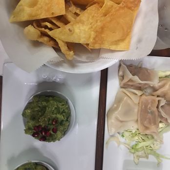 Lucha Tigre - Wouldn't recommend either of these appetizers- chips & guac, dumplings - Asian Fusion Near Me - Chapel Hill, North Carolina