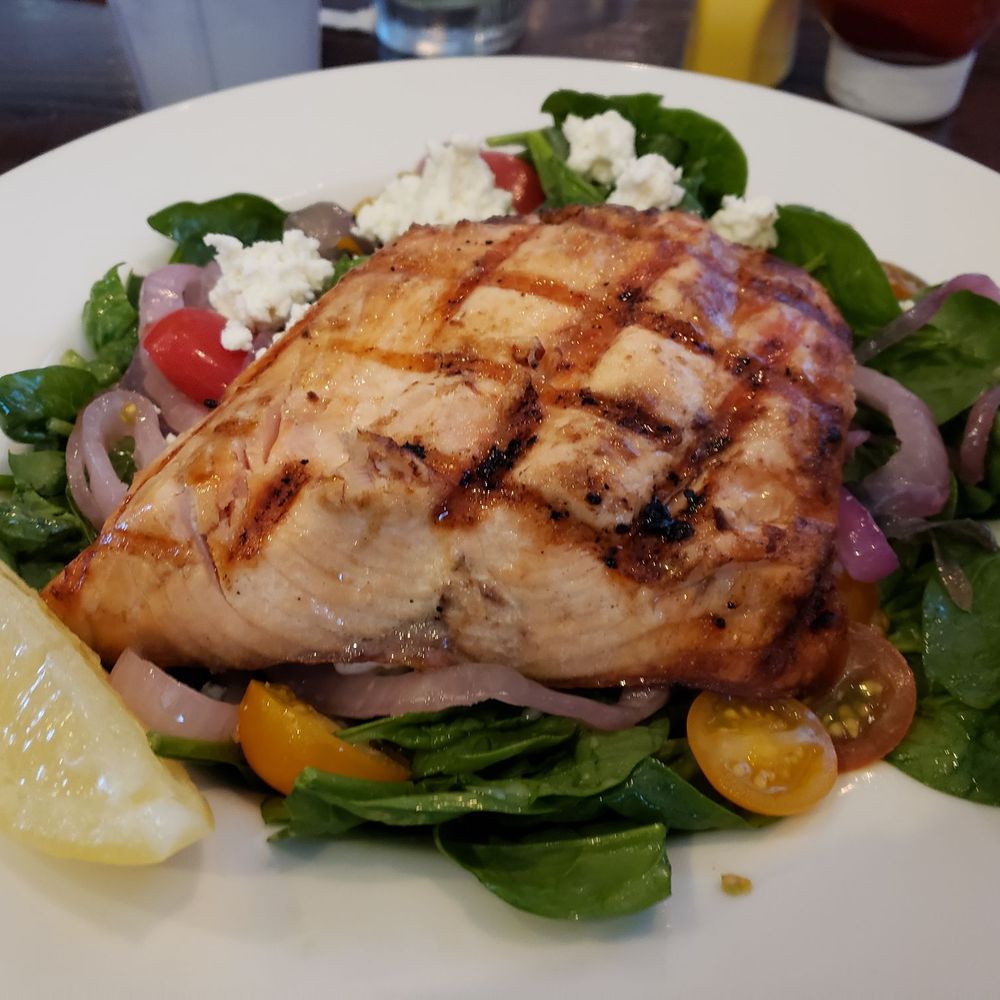Jack's Restaurant & Bar - Grilled salmon on a spinach salad - American Near Me - San Bruno, California Jack's Restaurant & Bar - Grilled salmon on a spinach salad - American Near Me - San Bruno, California