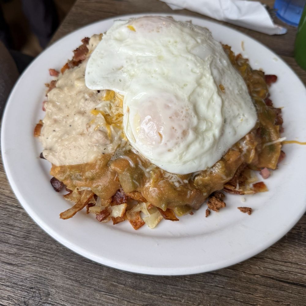 Doug's Day Diner - Cowboy Papas smothered in 1/2 green chili 1/2 gravy - Breakfast & Brunch Near Me - Loveland, Colorado
