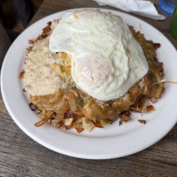 Doug's Day Diner - Cowboy Papas smothered in 1/2 green chili 1/2 gravy - Breakfast & Brunch Near Me - Loveland, Colorado Doug's Day Diner - Cowboy Papas smothered in 1/2 green chili 1/2 gravy - Breakfast & Brunch Near Me - Loveland, Colorado