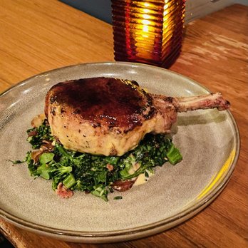 Indigenous Restaurant - Pork chop - New American Near Me - Sarasota, Florida