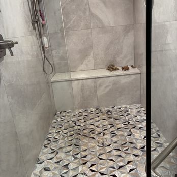 TileTek - Walk-in shower marble floor and shower bench/wall tile - Flooring Near Me - St. Augustine, Florida TileTek - Walk-in shower marble floor and shower bench/wall tile - Flooring Near Me - St. Augustine, Florida