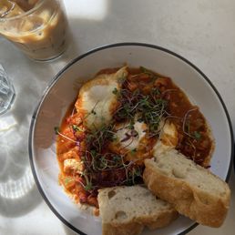 Shakshuka and iced latte Shakshuka and iced latte