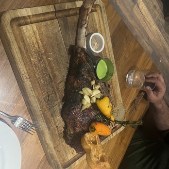The Bancroft - Tomahawk steak before being cut - New American Near Me - Burlington, Massachusetts