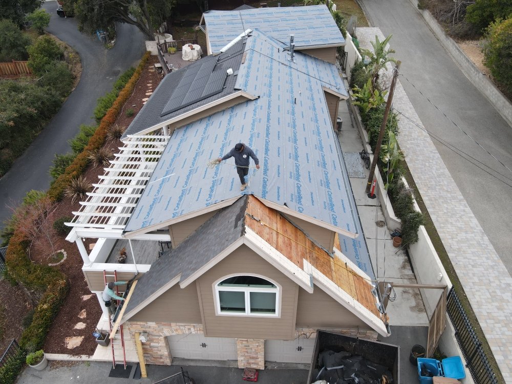 Slide of Real Roofing