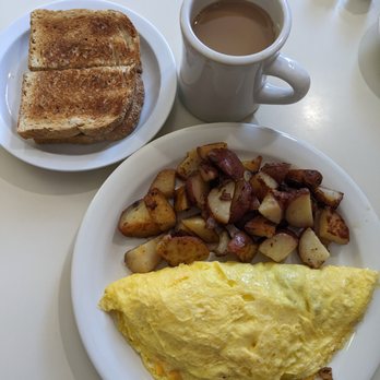 Ok Cafe - Omelet with coffee, toast and home fries at Ok Cafe - American Near Me - Tombstone, Arizona