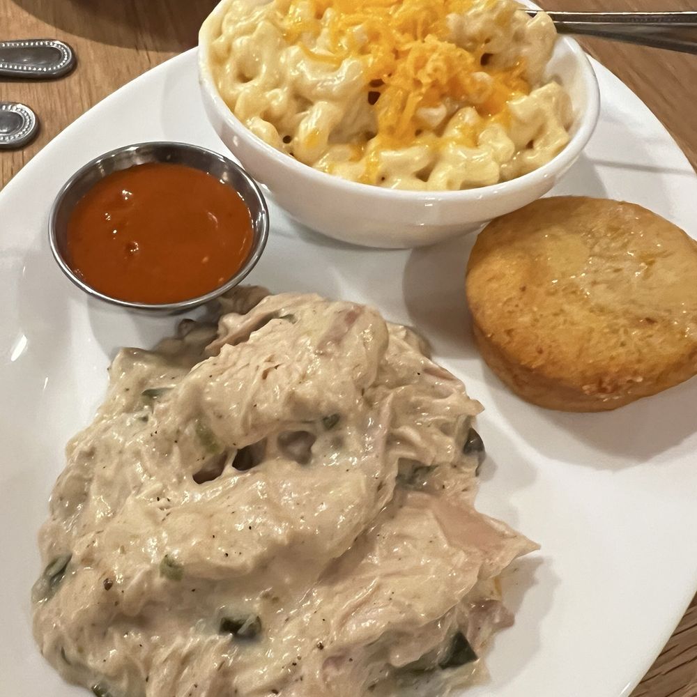 Brasa - Smothered Chicken with Mac and Cheese and Cornbread (4/5) - Southern Near Me - Minneapolis, Minnesota Brasa - Smothered Chicken with Mac and Cheese and Cornbread (4/5) - Southern Near Me - Minneapolis, Minnesota